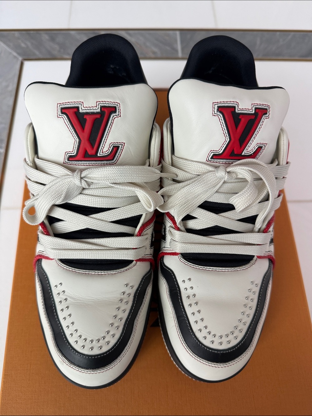 Louis Vuitton LV trainer studded sneakers red white black color way